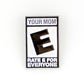 The Your Mom “Rated E” pin by Ballmarkers from Logie Joes features a large black E, “YOUR MOM” above, and “RATE E FOR EVERYONE” below—mimicking a game rating for a funny golf accessory.