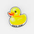 The Rubber Duck You by Ballmarkers from Logie Joes is a yellow duck pin with an orange beak and Duck You! at the bottom—a fun, playful golf accessory on a plain white background.