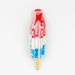 Ballmarkers by Logie Joes Red White Blue Popsicle is a novelty golf accessory shaped like a classic rocket ice pop, making this premium ball marker a standout addition to your golf gear.
