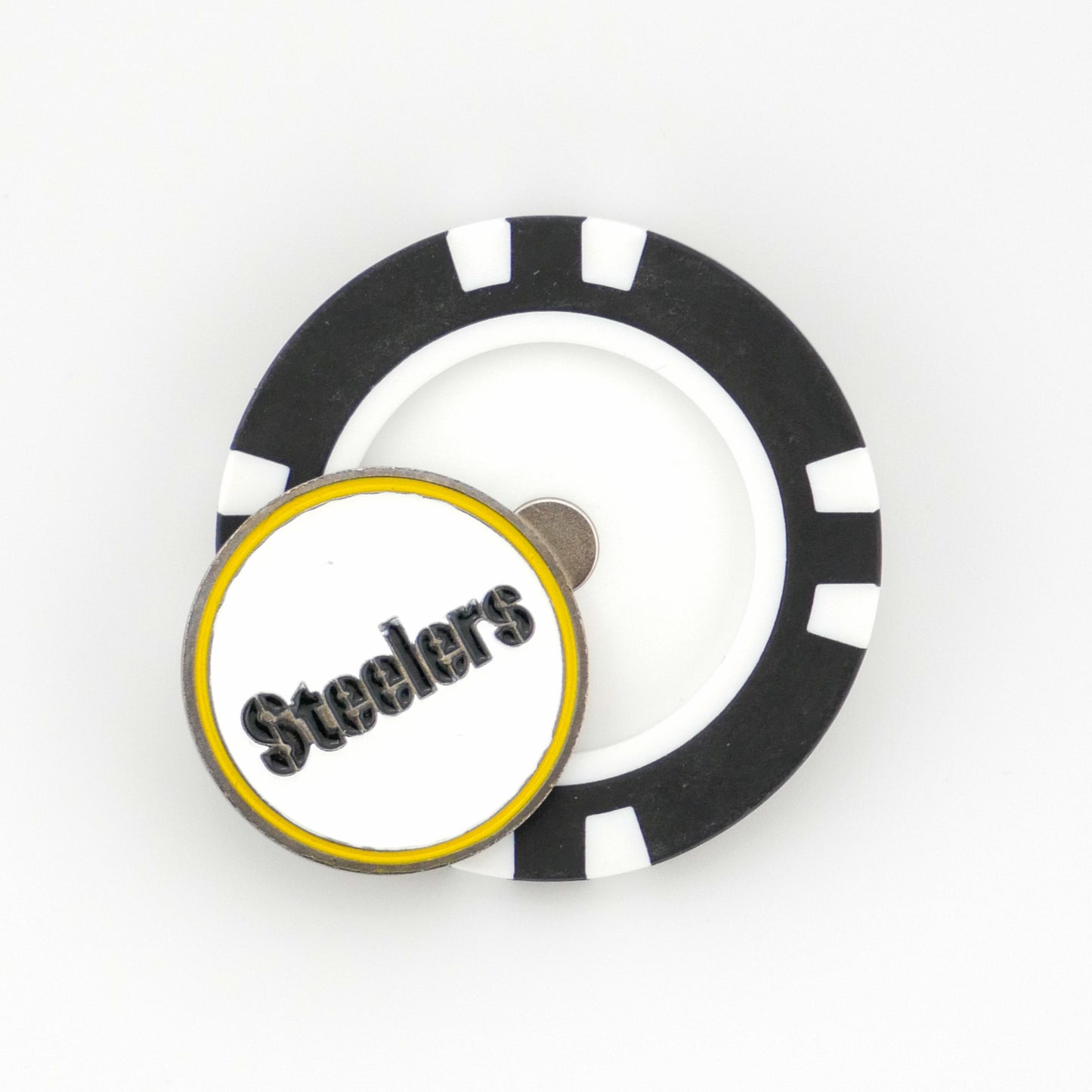 A black and white poker chip ball marker by Ballmarkers from Logie Joes features a round magnet, partially covered by a circular Pittsburgh Steelers marker with a yellow border and bold, slanted text.