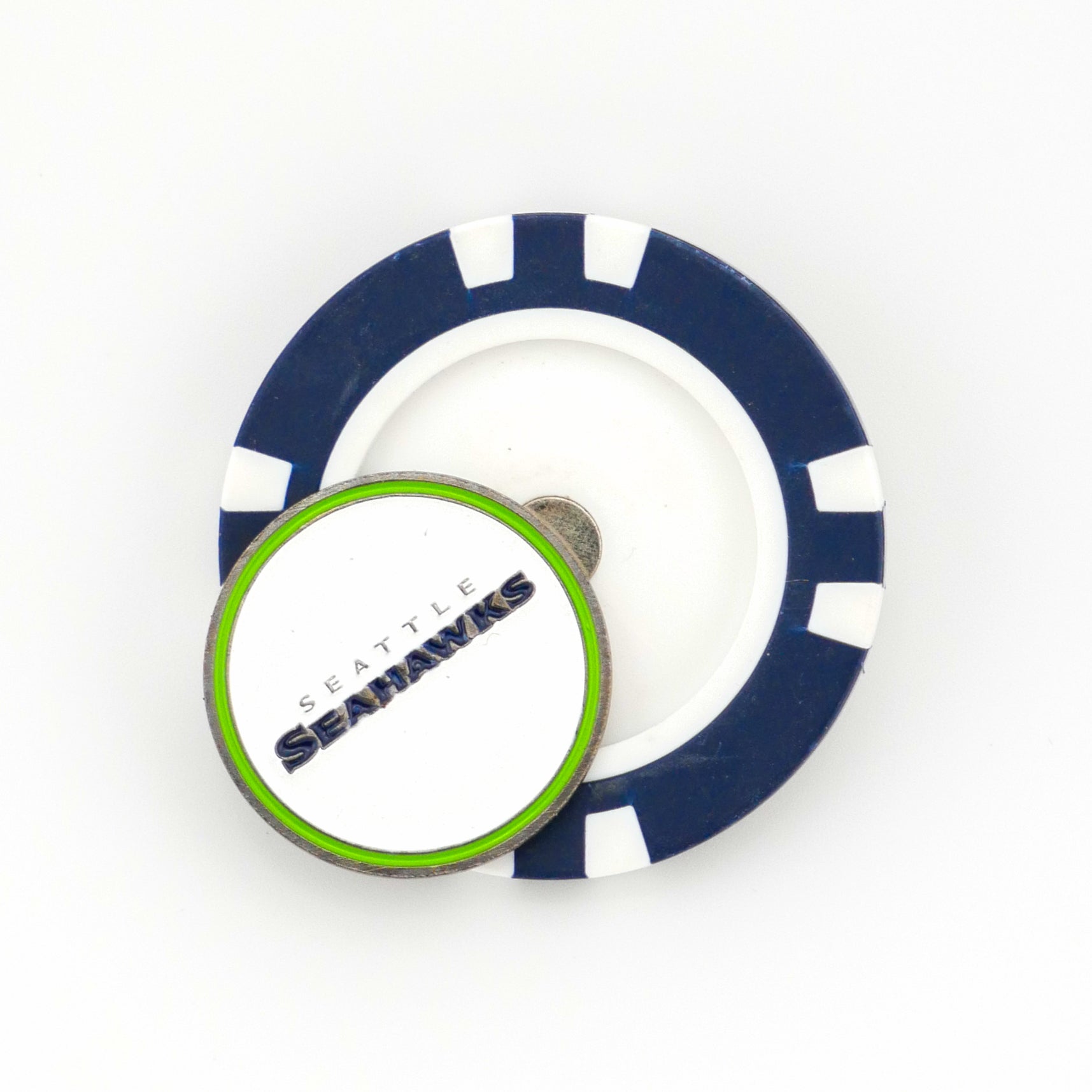 A blue and white poker chip ball marker by Ballmarkers from Logie Joes, featuring a round Seattle Seahawks token with the team name in bold blue and green letters.