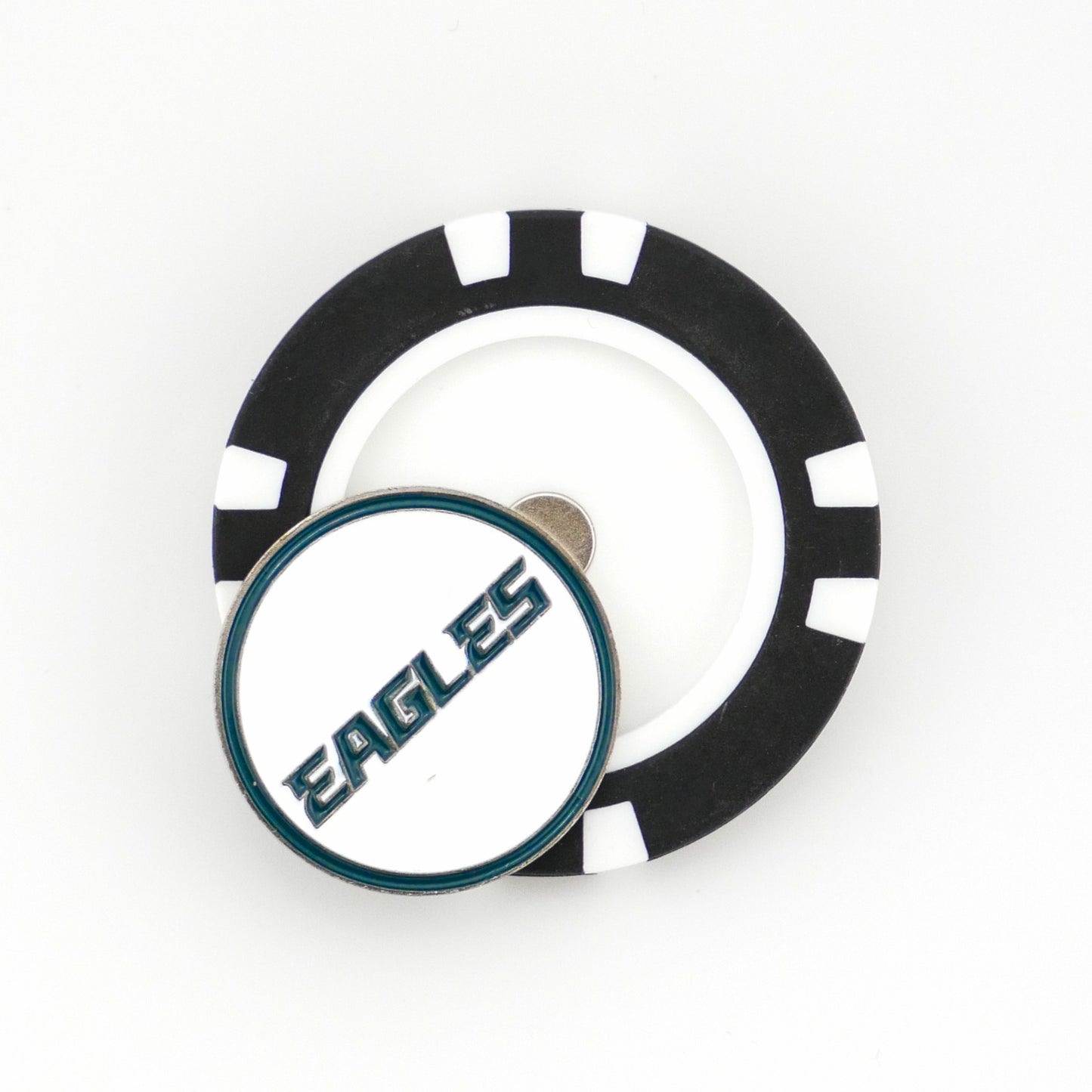 A Philadelphia Eagles poker chip ball marker by Ballmarkers from Logie Joe’s rests on a white surface, topped with a round marker featuring EAGLES in bold, stylized letters.