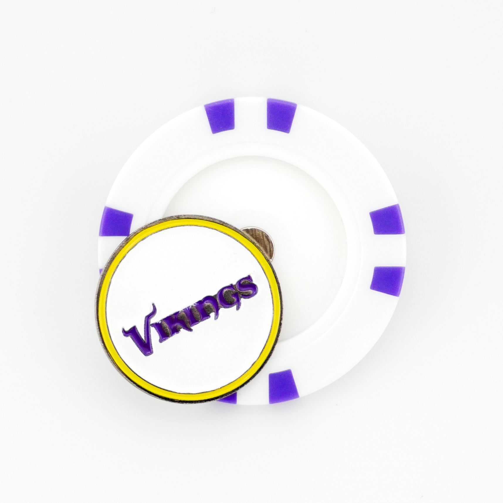 A white poker chip-style marker with purple accents holds a round Minnesota Vikings golf ball marker with Vikings in purple on a white background with a yellow border. Brand: Ballmarkers by Logie Joes.