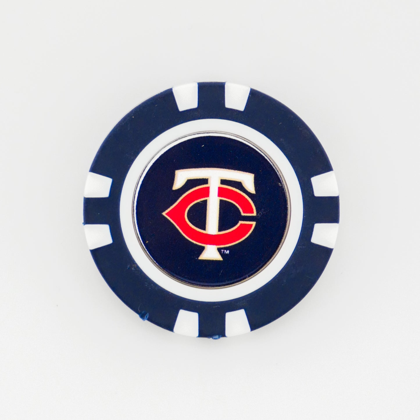 A blue and white poker chip ball marker by Ballmarkers from Logie Joes, featuring the Minnesota Twins logo: a red C interlocked with a white T on a dark blue background.