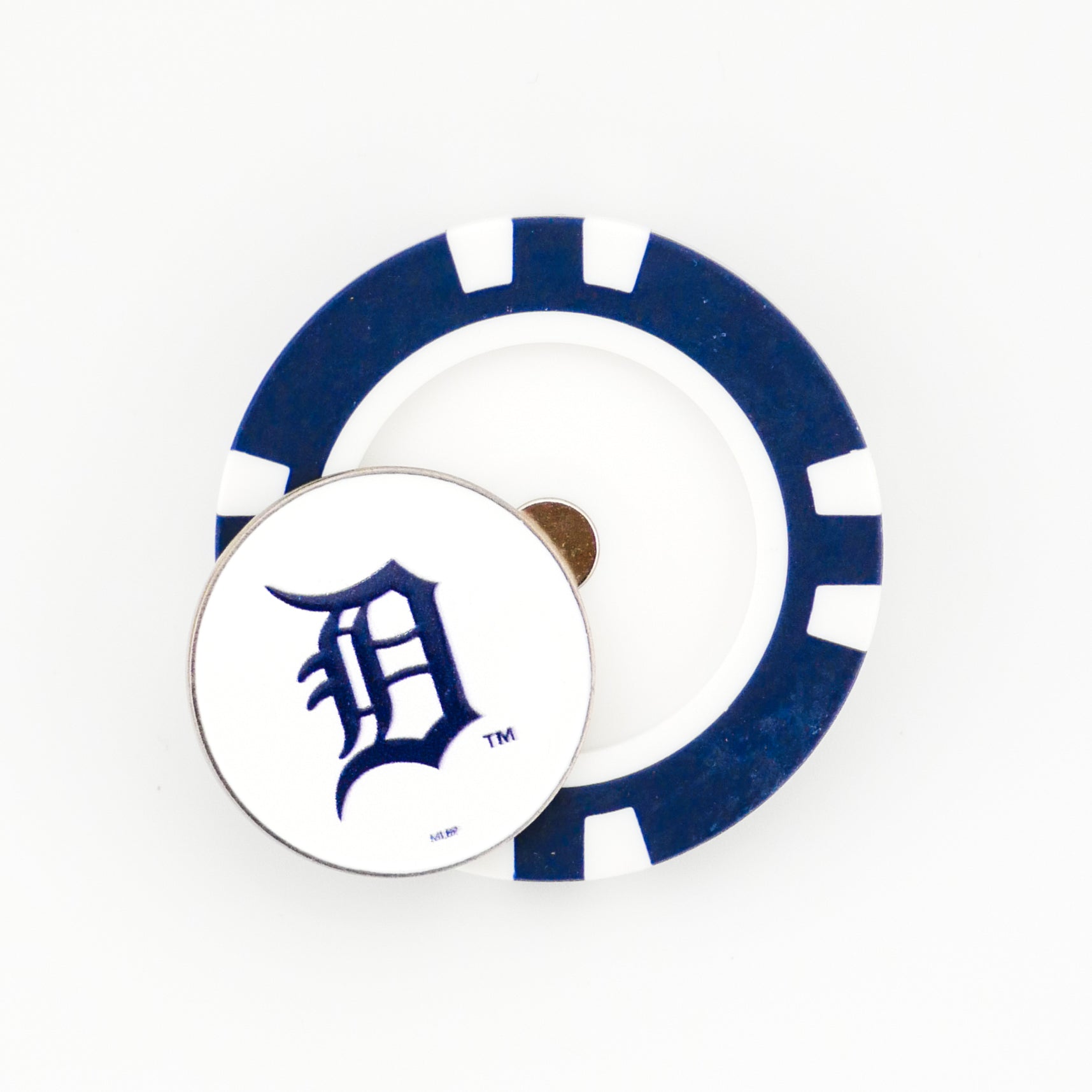 The Detroit Tigers ball marker by Ballmarkers from Logie Joes is a blue and white poker chip with a coin featuring a navy blue stylized D on white, resembling the team logo.