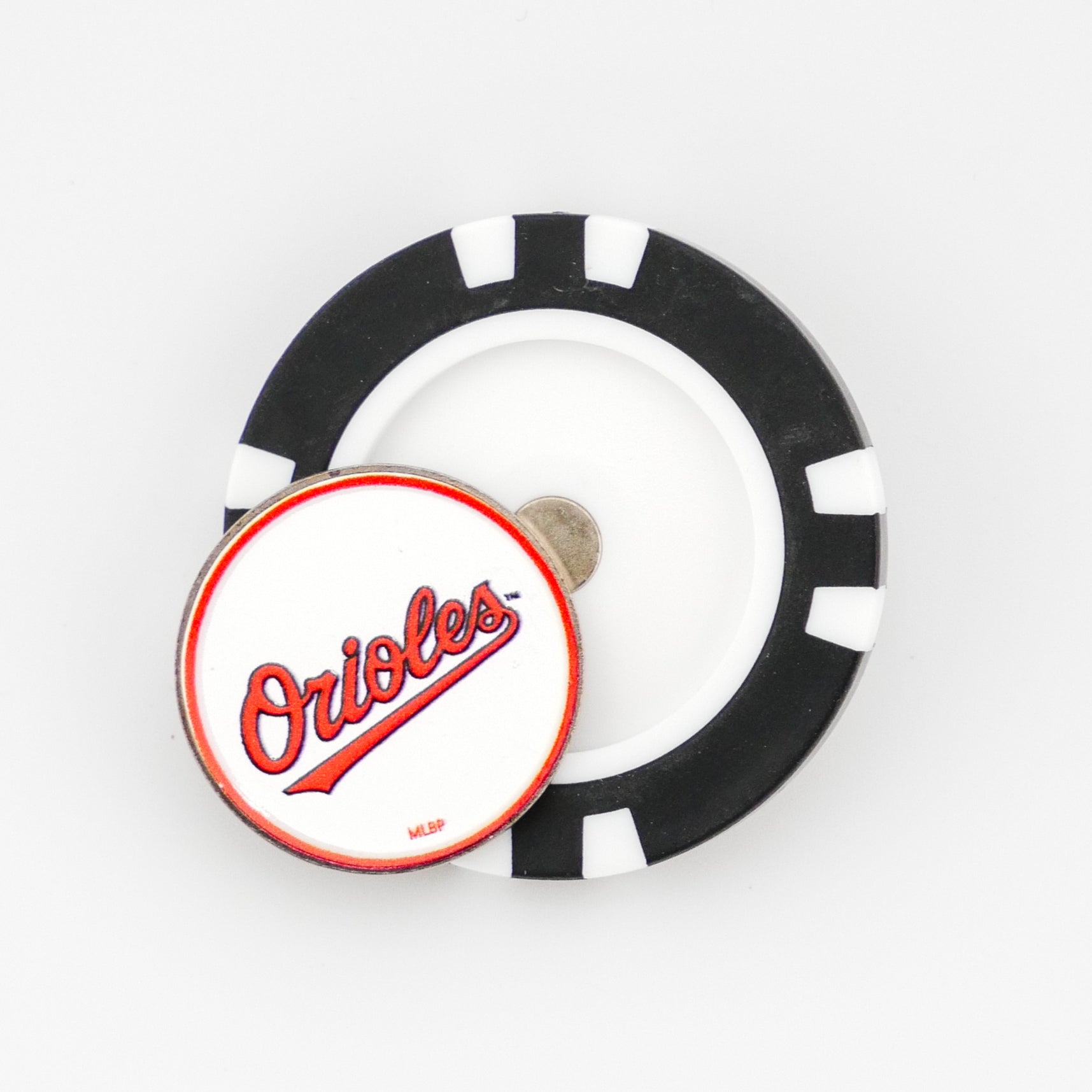 A black and white Ballmarkers by Logie Joe’s poker chip ball marker with a round Baltimore Orioles logo marker on top, shown on a plain white background.